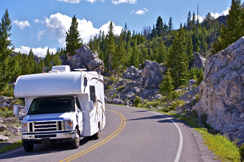 RV Motorhome driving through mountains Southeast financial