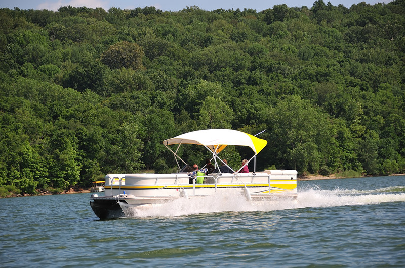 Pontoon boat on a lake Southeast Financial
